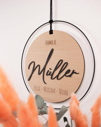 Personalisiertes Türschild aus Holz im Metallring
